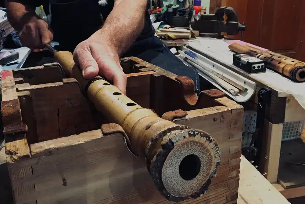 Technician building a shakuhachi